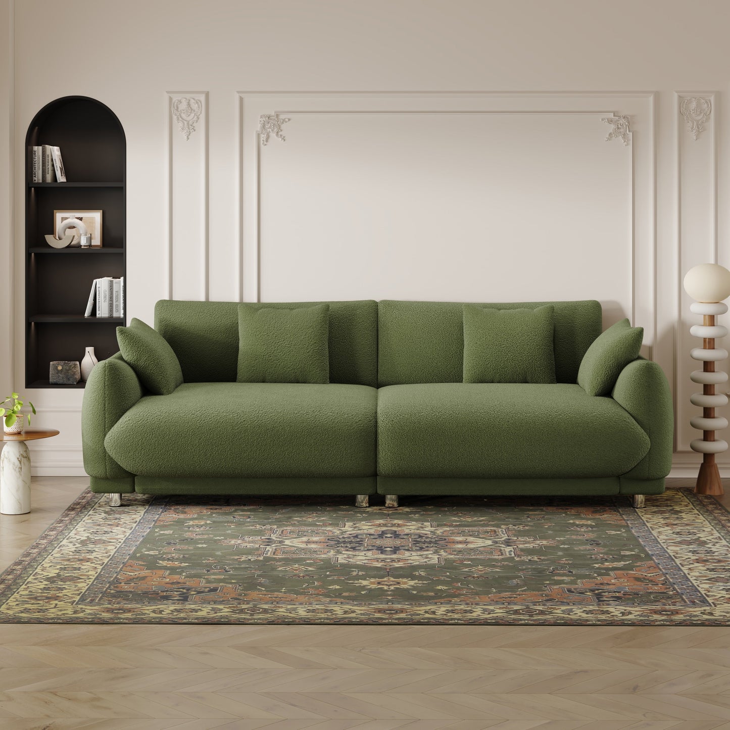 Un divano verde in lana teddy da 86,6 pollici con quattro cuscini e piedini in metallo che può stare comodamente in una camera da letto di un appartamento con
