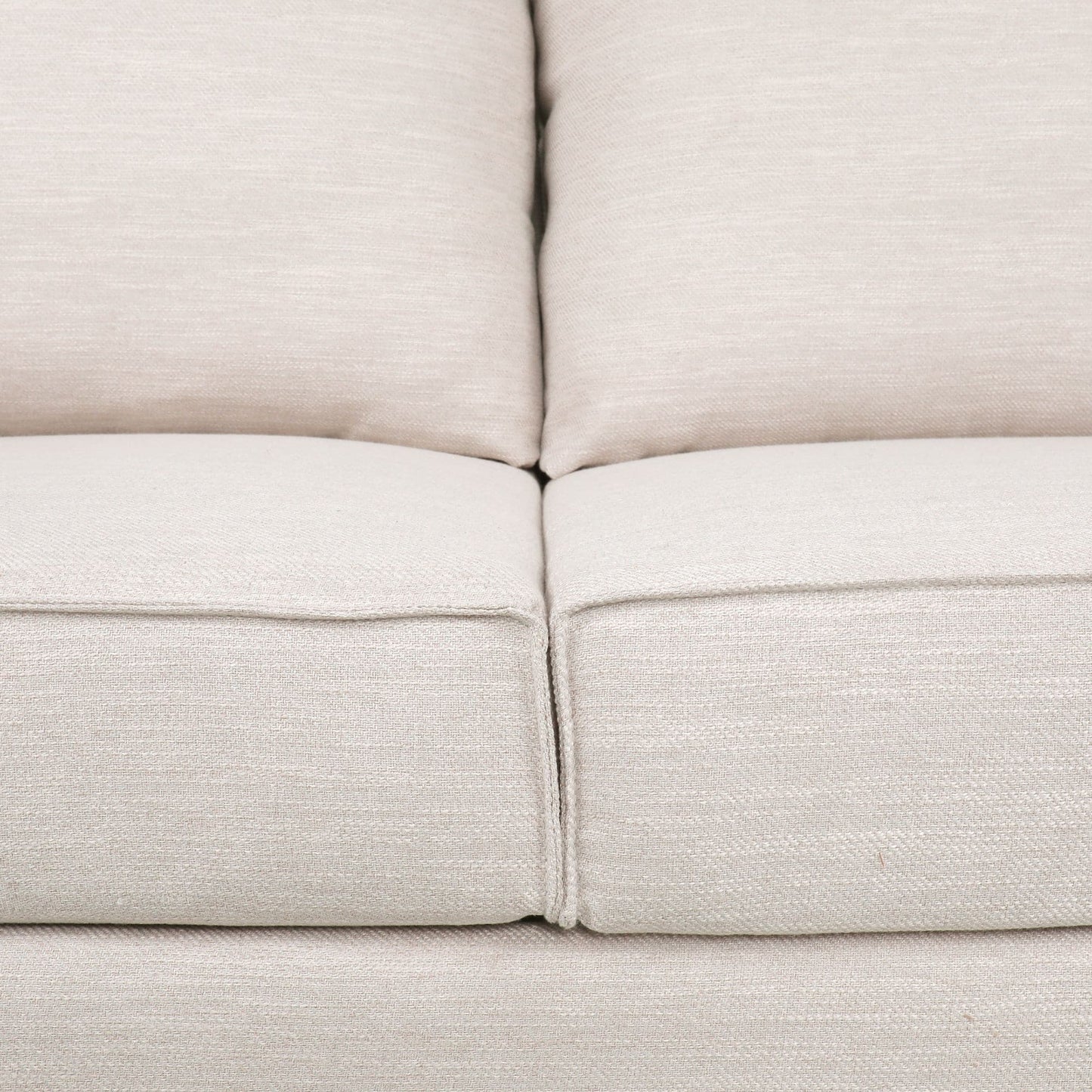 Divano a 3 posti imbottito beige con cuscini e gambe in legno
