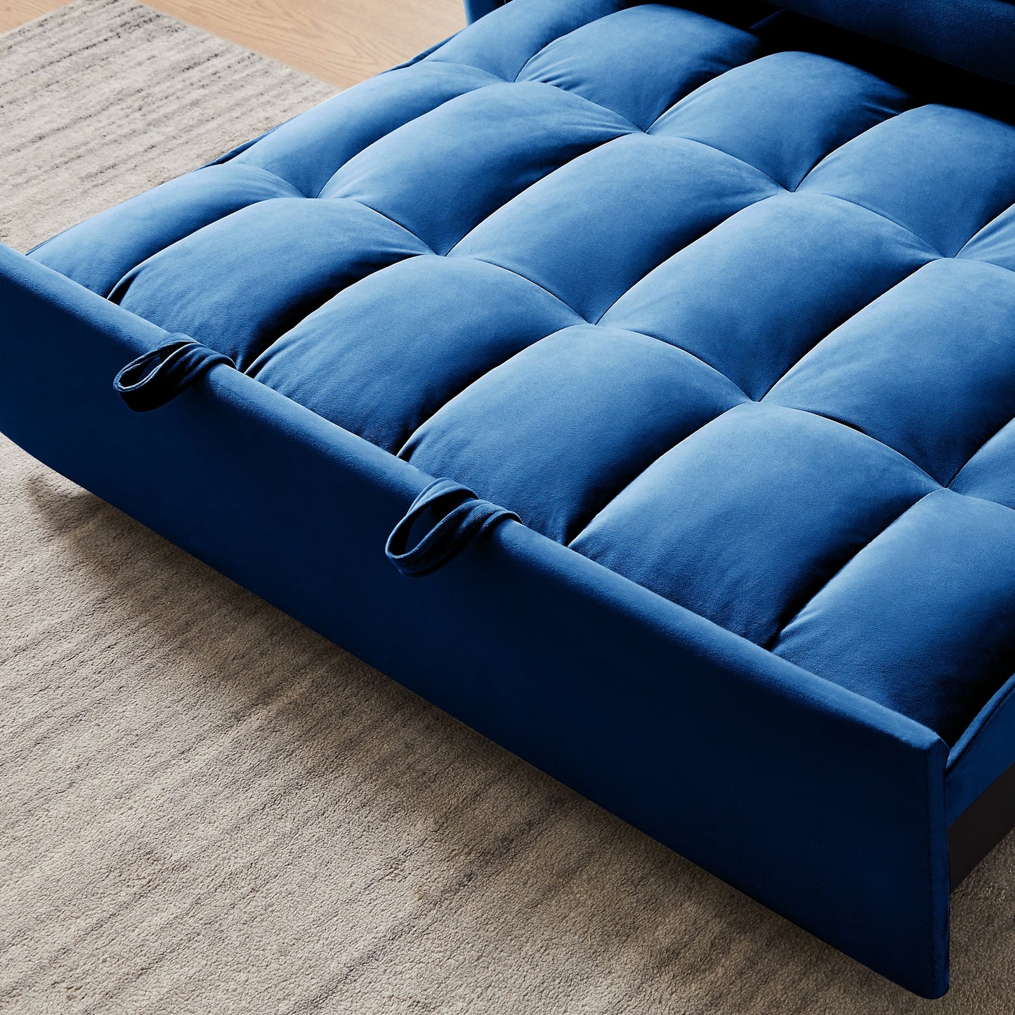 Divano letto blu con borsa portaoggetti