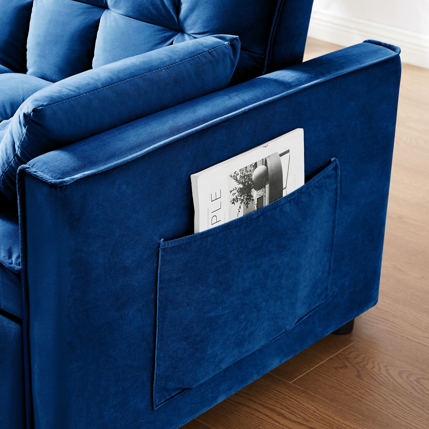 Divano letto blu con borsa portaoggetti