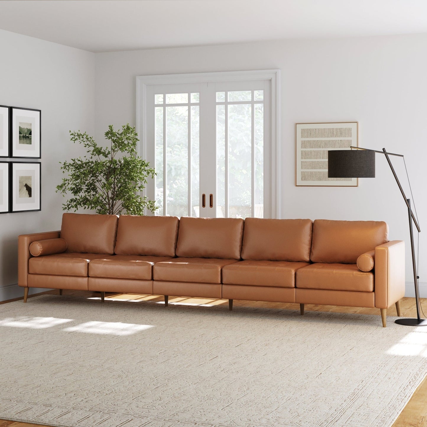 Divano Breeze Mid Century Modern, divano in pelle con cuscino trapuntato e struttura in legno massello