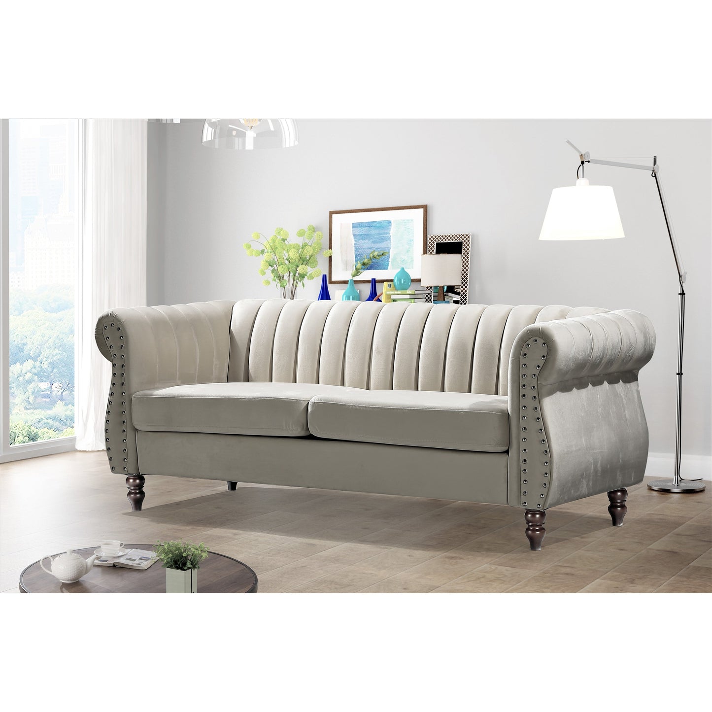 Divano Chesterfield in velluto Charlot con braccioli arrotolati