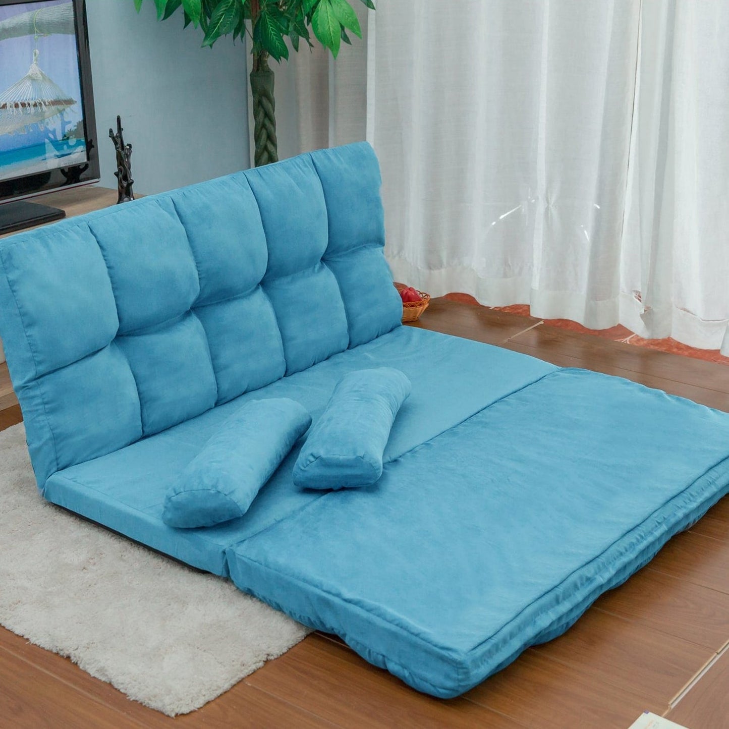 Divano chaise longue da pavimento con due cuscini