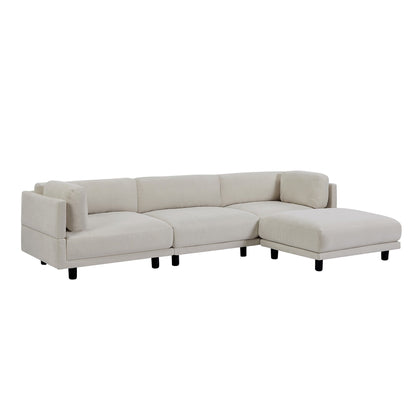 Divano componibile a L in poliestere 102.4 con poggiapiedi reversibile, cuscini spessi e gambe in plastica