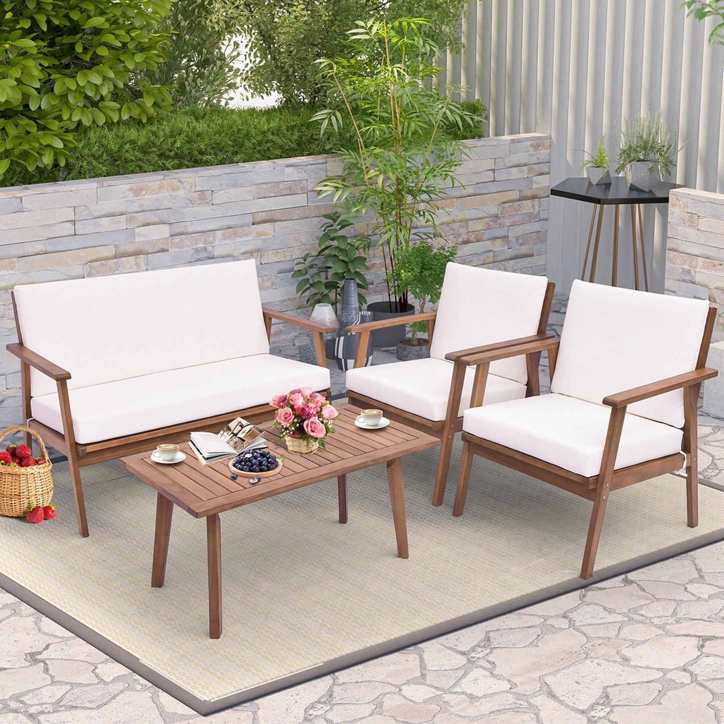 Set da conversazione da giardino con divano e tavolino in legno di acacia da 4 pezzi con cuscini