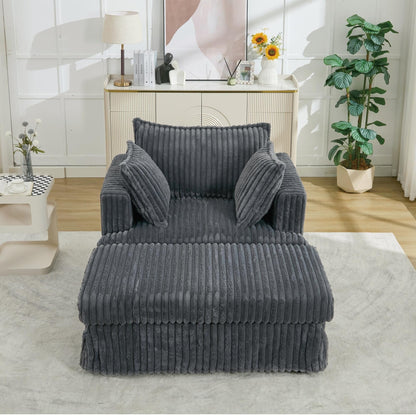 47.7 Chaise Longue oversize in velluto a coste con pouf