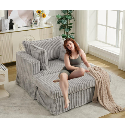 47.7 Chaise Longue oversize in velluto a coste con pouf