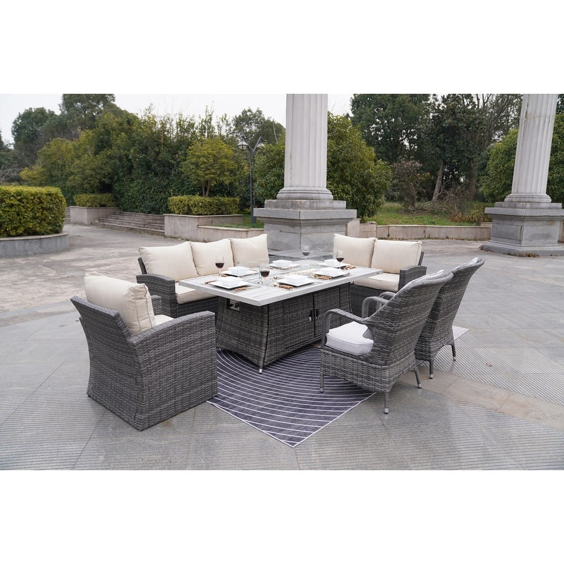 Set di divani da giardino in rattan da 7 pezzi con tavolo da pranzo in alluminio e poltrone