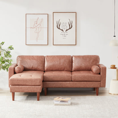 Divano componibile a L in tessuto 80 con cuscini trapuntati e chaise longue reversibile