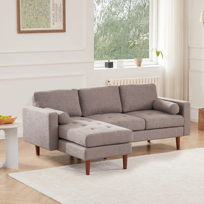Divano componibile a L in tessuto 80 con cuscini trapuntati e chaise longue reversibile