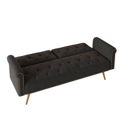 Un divano letto lungo 69,7 pollici rivestito in tessuto di velluto, con finiture a borchie e accompagnato da un cuscino coordinato.