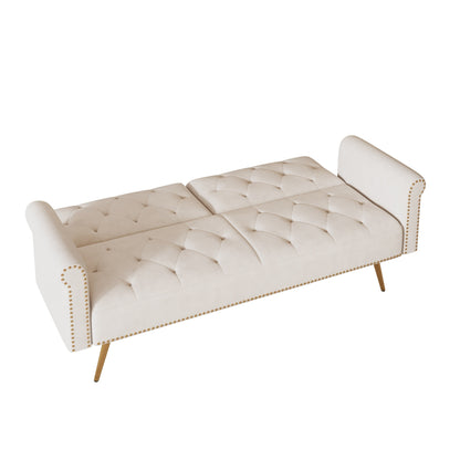 Un divano letto lungo 69,7 pollici rivestito in tessuto di velluto, con finiture a borchie e accompagnato da un cuscino coordinato.