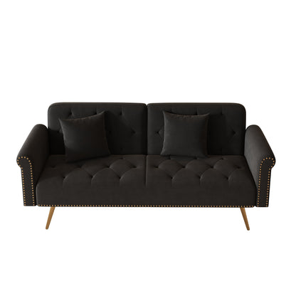 Un divano letto lungo 69,7 pollici rivestito in tessuto di velluto, con finiture a borchie e accompagnato da un cuscino coordinato.