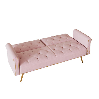 Un divano letto lungo 69,7 pollici rivestito in tessuto di velluto, con finiture a borchie e accompagnato da un cuscino coordinato.