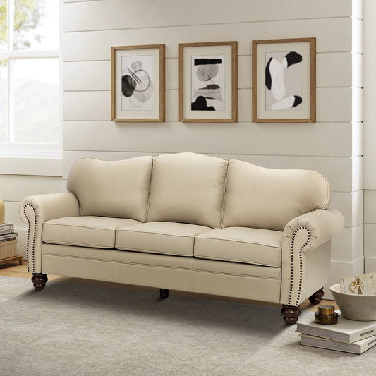 Divano Balvino 81 Wide Transitional in vera pelle con braccioli arrotolati, finiture con borchie e cuscini rimovibili
