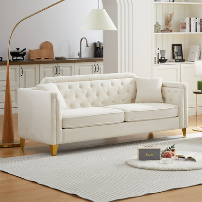 Divano capitonné a 3 posti in ciniglia beige con decorazione a chiodi in rame