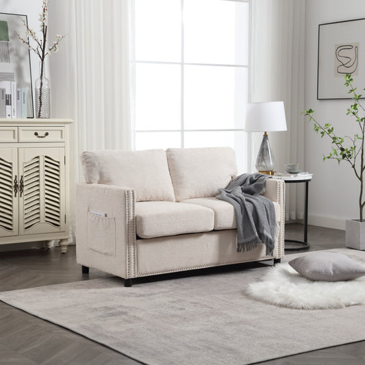 Divano a due posti in ciniglia beige con tasca e borchie