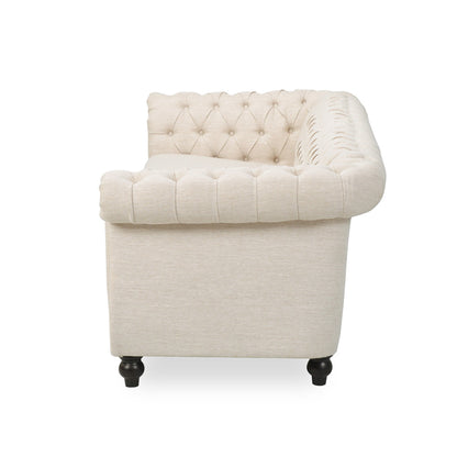 Divano Chesterfield beige 84.75 imbottito con bottoni, 3 posti, borchie e gambe in legno