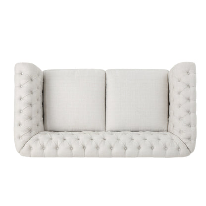 Divano a due posti Chesterfield beige con bottoni e borchie