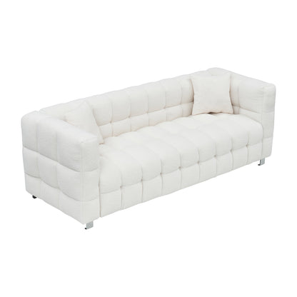 Divano Teddy beige a 3 posti con due cuscini decorativi