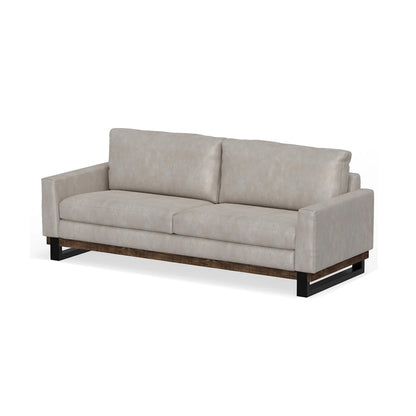 Divano Bery, base moderna in legno massello di pino, morbida similpelle color avorio bianco