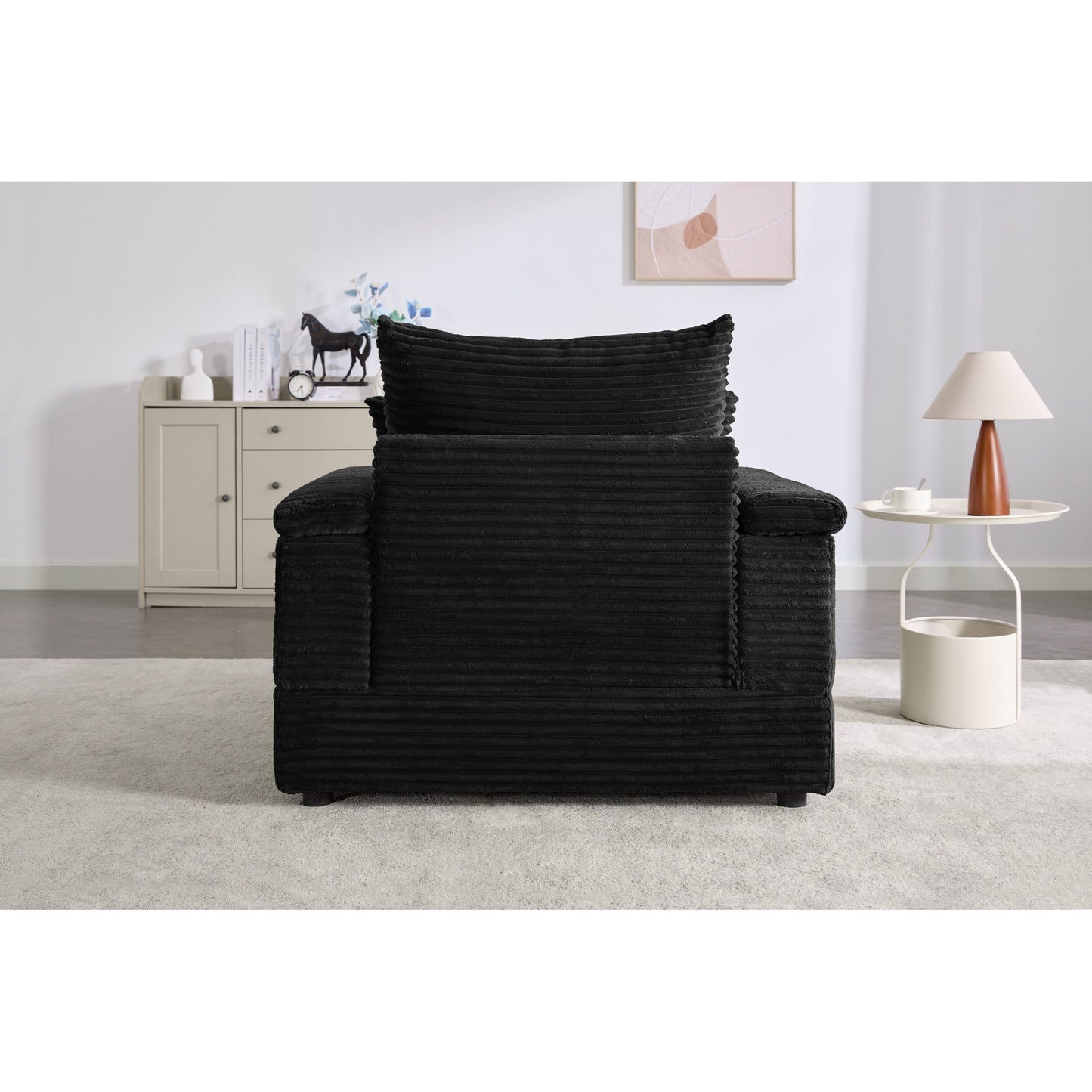 Divano letto singolo in velluto a coste nero 42.52 con seduta profonda, poggiapiedi rimovibile, bracciolo contenitore e 2 cuscini decorativi