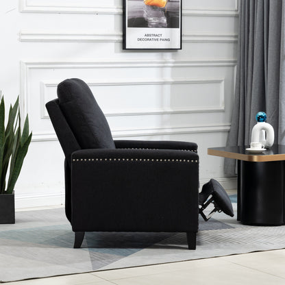 Poltrona reclinabile manuale moderna rivestita in velluto nero con morbidi cuscini e poggiapiedi, decorazione con borchie