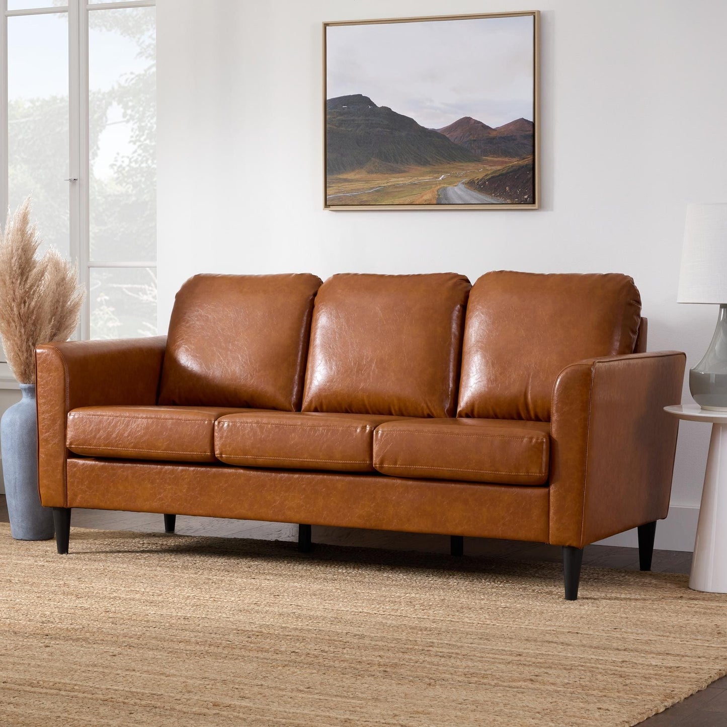 Divano imbottito con braccioli curvi Brookside Clara 73