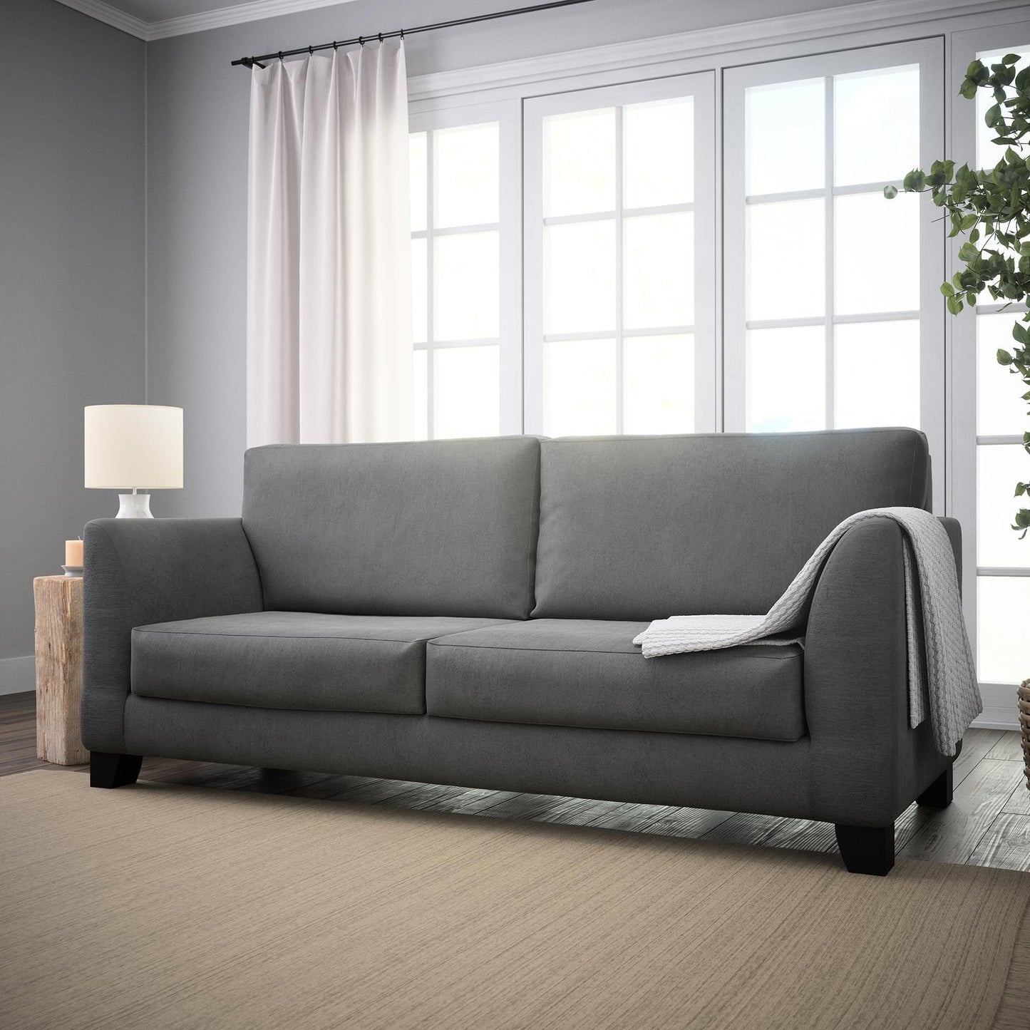 Divano imbottito con braccioli svasati Brookside Holly 85