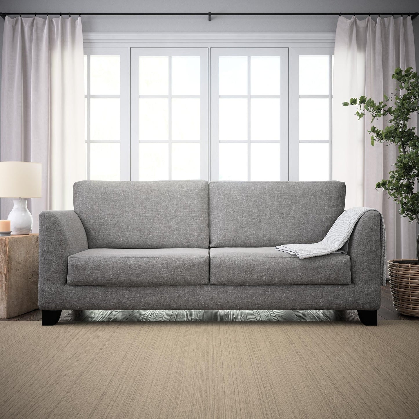 Divano imbottito con braccioli svasati Brookside Holly 85