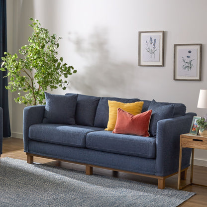 Divano imbottito con base in legno Brookside Kay
