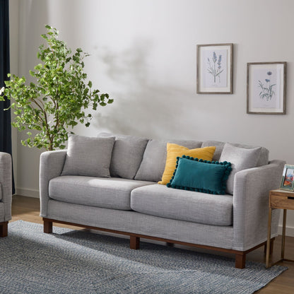 Divano imbottito con base in legno Brookside Kay