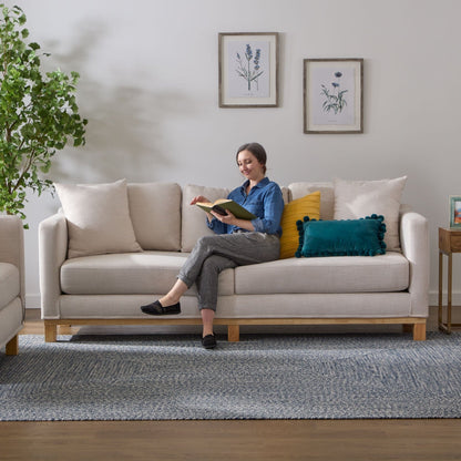 Divano imbottito con base in legno Brookside Kay