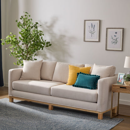 Divano imbottito con base in legno Brookside Kay