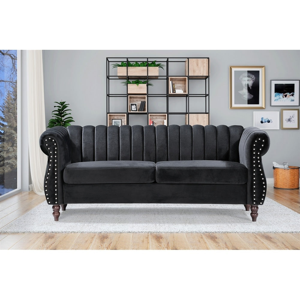 Divano Chesterfield in velluto Charlot con braccioli arrotolati