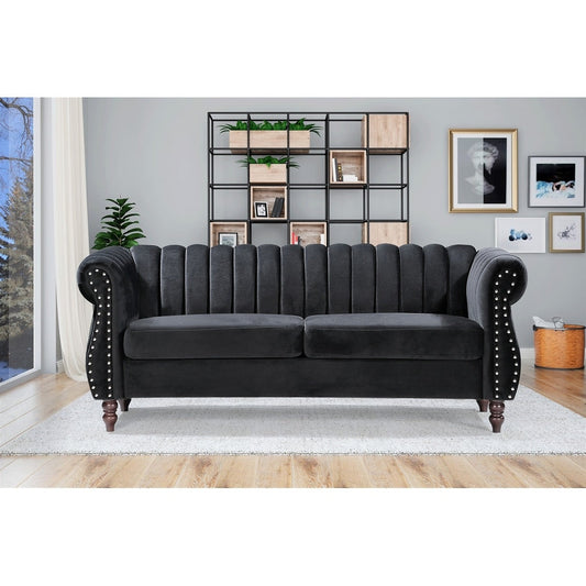 Divano Chesterfield in velluto Charlot con braccioli arrotolati