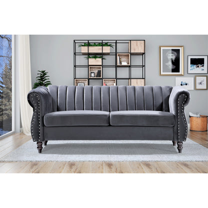 Divano Chesterfield in velluto Charlot con braccioli arrotolati