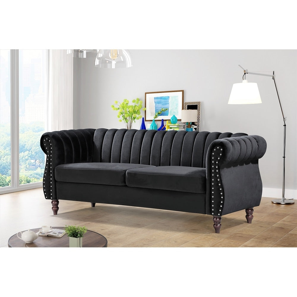 Divano Chesterfield in velluto Charlot con braccioli arrotolati