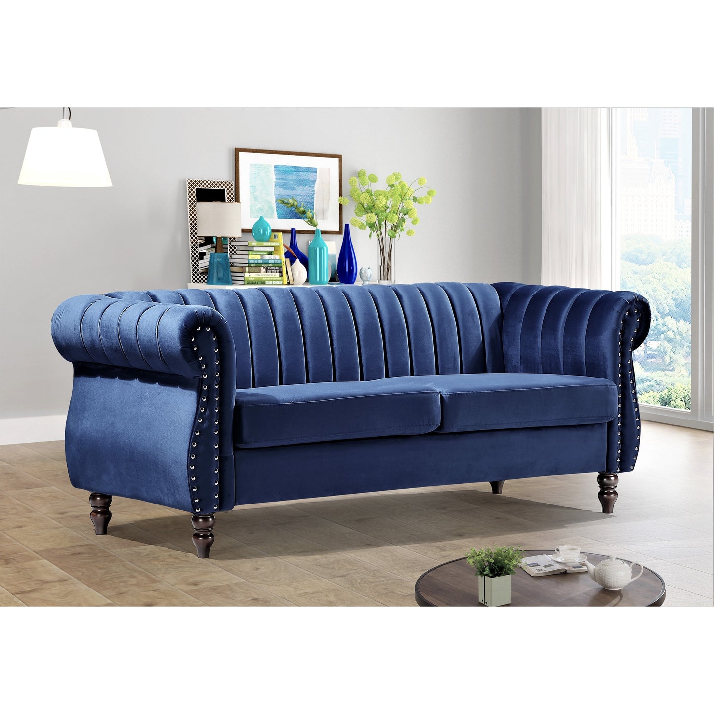 Divano Chesterfield in velluto Charlot con braccioli arrotolati