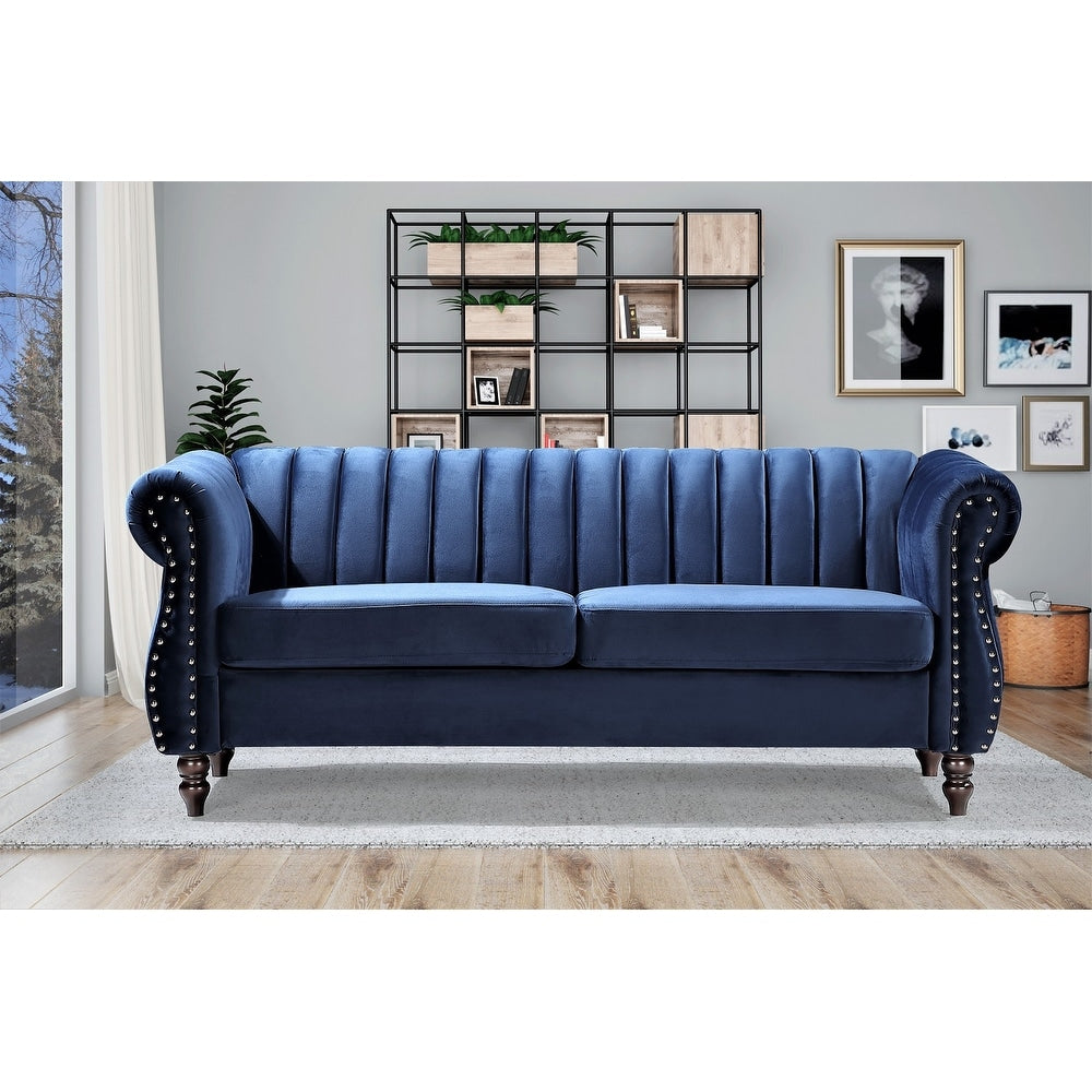 Divano Chesterfield in velluto Charlot con braccioli arrotolati