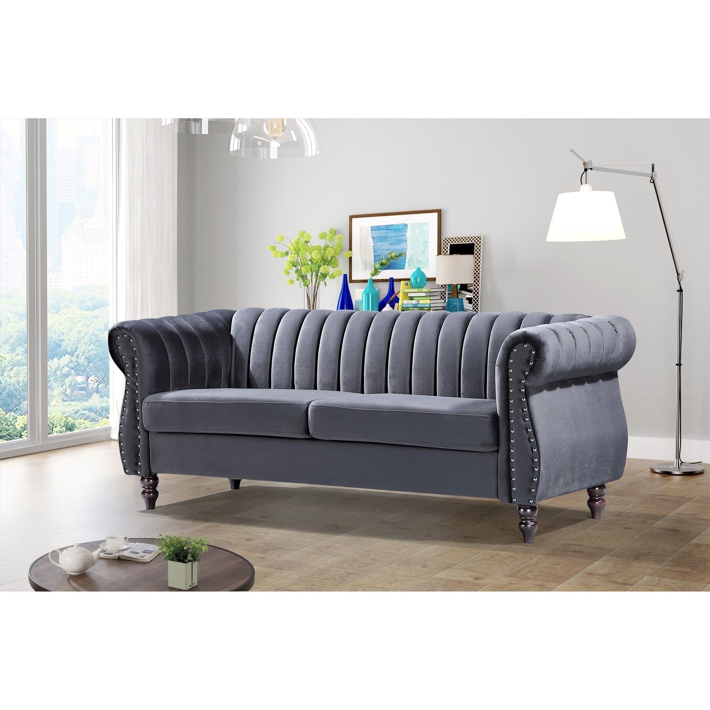 Divano Chesterfield in velluto Charlot con braccioli arrotolati