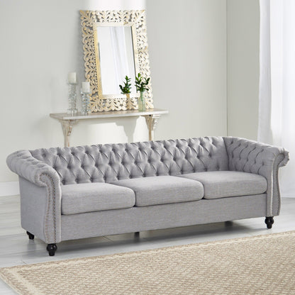 Divano Chesterfield a 3 posti con bottoni e borchie