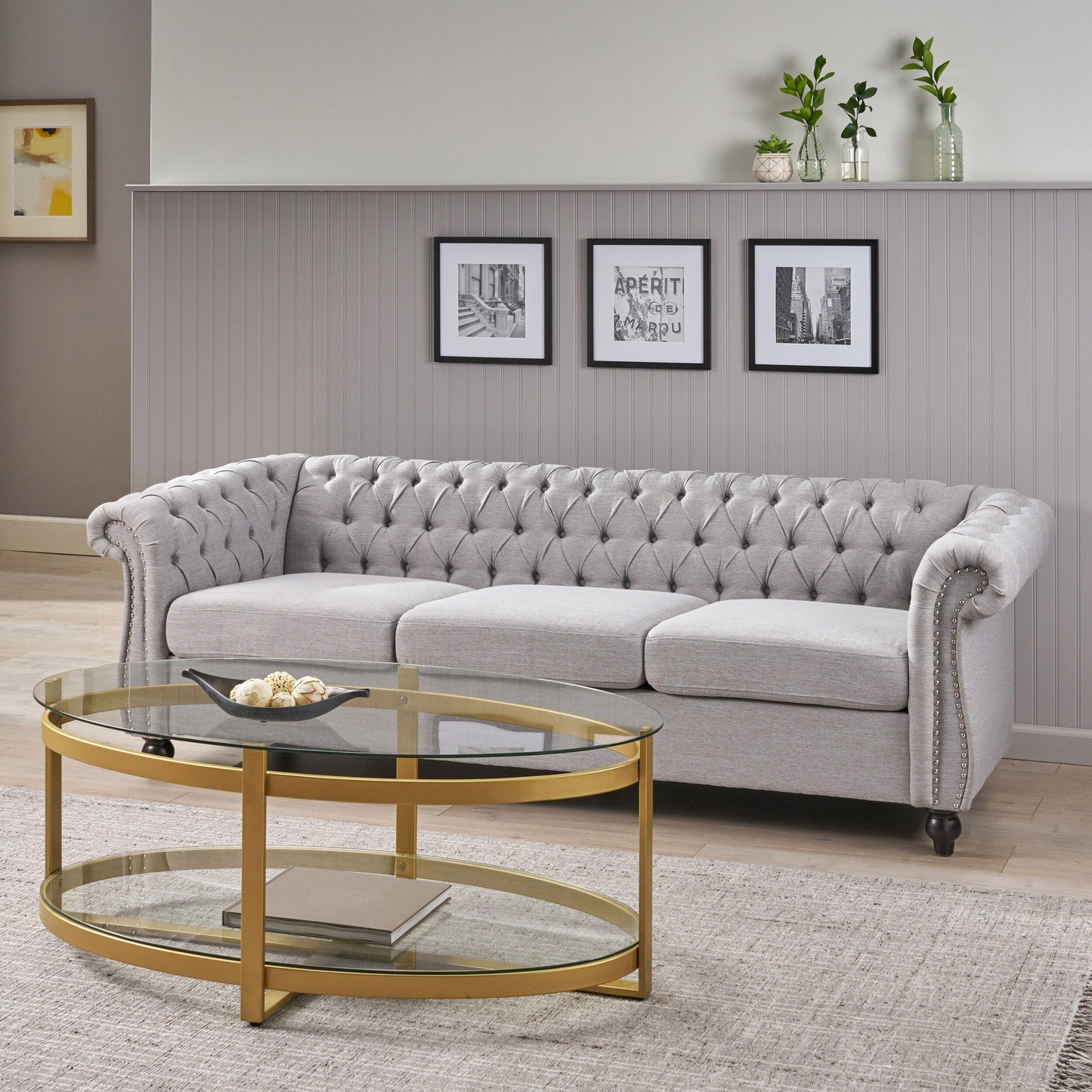 Divano Chesterfield a 3 posti con bottoni e borchie