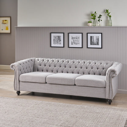 Divano Chesterfield a 3 posti con bottoni e borchie