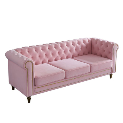 Divano Chesterfield in velluto con finiture dorate
