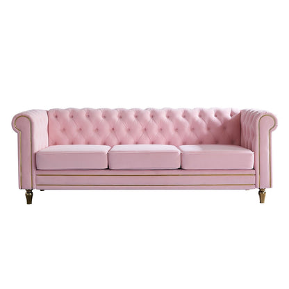 Divano Chesterfield in velluto con finiture dorate