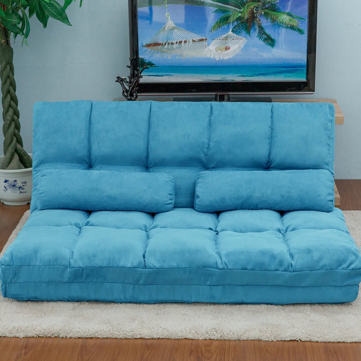 Divano chaise longue da pavimento con due cuscini