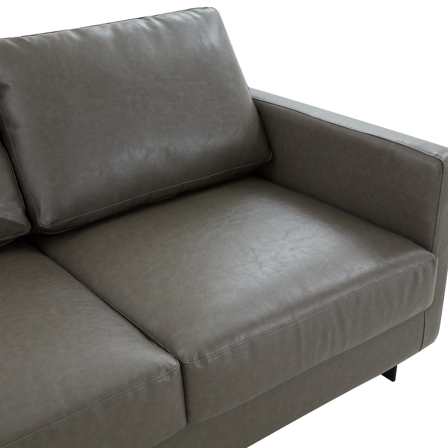 Divano a 3 posti minimalista in pelle imbottita con cuscini rimovibili in acciaio inossidabile per soggiorno e camera da letto