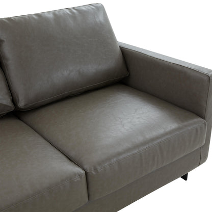 Divano a 3 posti minimalista in pelle imbottita con cuscini rimovibili in acciaio inossidabile per soggiorno e camera da letto