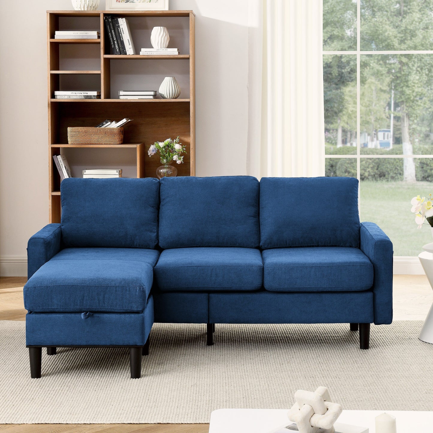 Divano componibile imbottito con pouf